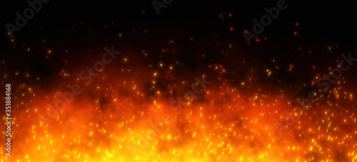 Fire embers particles over black black background. Fire sparks background. Abstract dark glitter fire particles lights. 