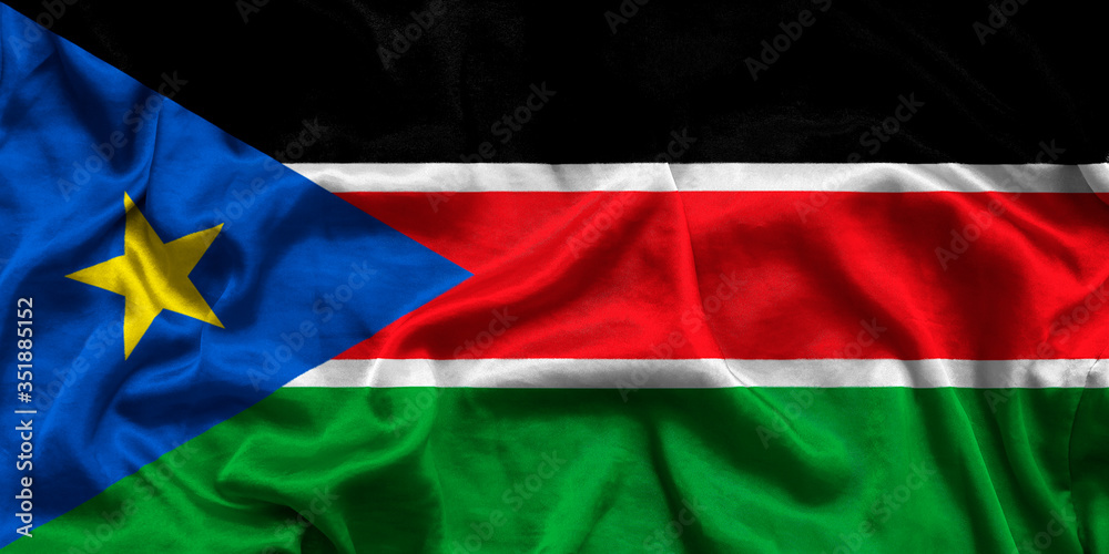 National flag of South Sudan background with fabric texture. Flag of South Sudan in correct proportions waving in the wind. 3D illustration National flag of South Sudan background with fabric texture. Flag of South Sudan in correct proportions waving in the wind. 3D illustration