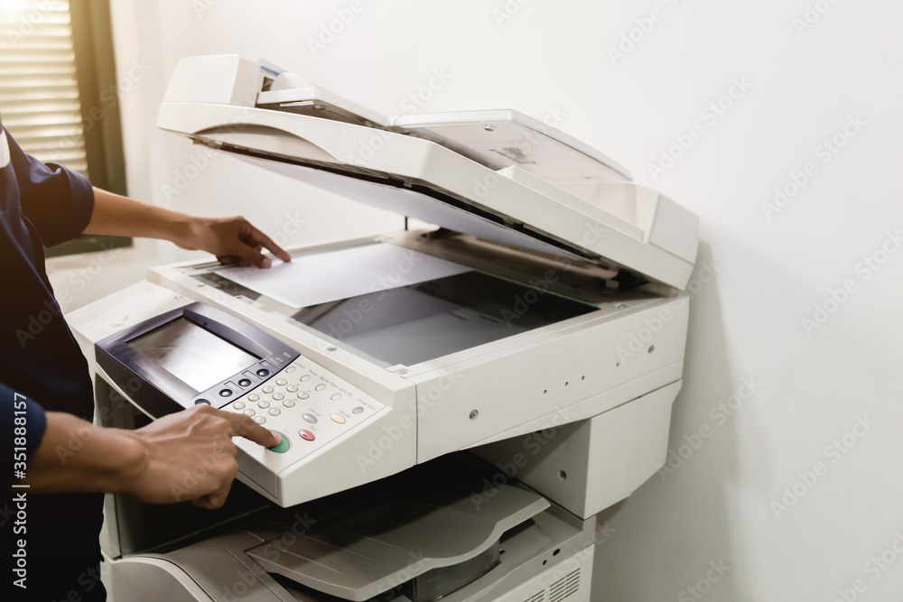 Business people keypad hand on the panel printer, printer, scanner, laser copier, office equipment, concept, start working Business people keypad hand on the panel printer, printer, scanner, laser copier, office equipment, concept, start working