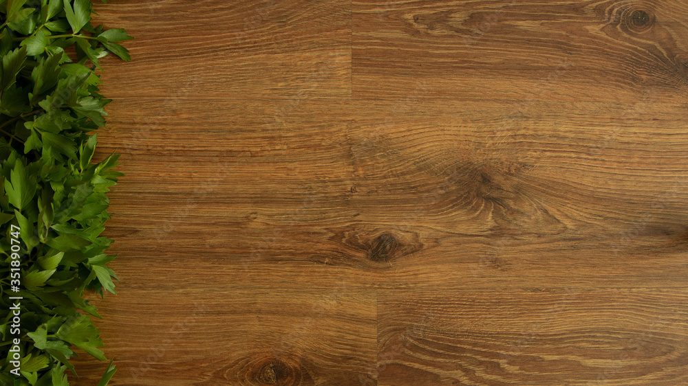 Fototapeta premium Tło żywności z świeżych liści lubczyka wiosennego