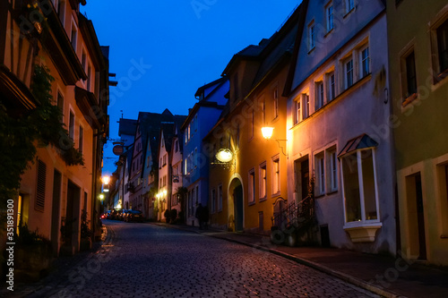 Night view to narrow medieval street in old town Rothenburg ob der Tauber  Bavaria  Germany. November 2014