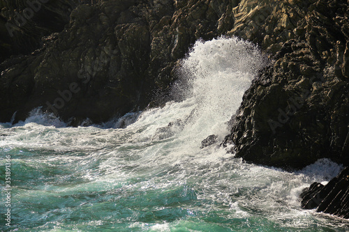 Waves crashing on a rocky shore