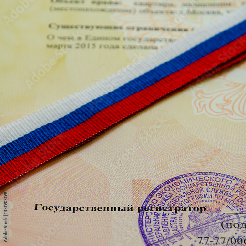 Moscow / Russia-May 2020: Russian tape is written against the background of the signature and stamp on the state document. Square format.