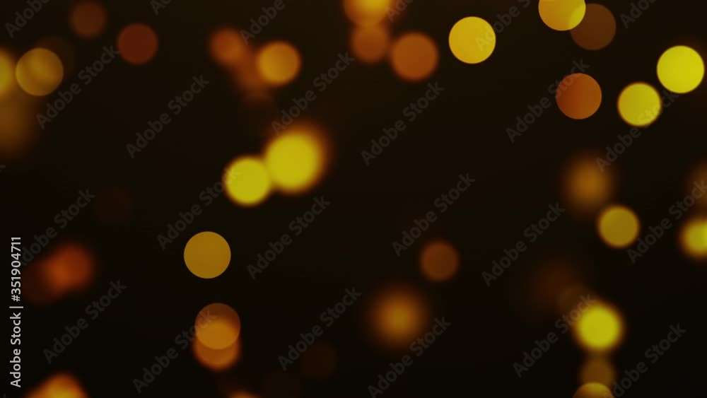 Abstract motion background bokeh golden particles effect 4K video resolution