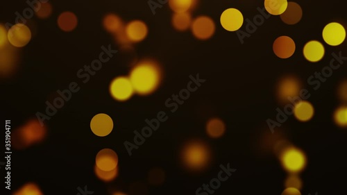 Abstract motion background bokeh golden particles effect 4K video resolution
