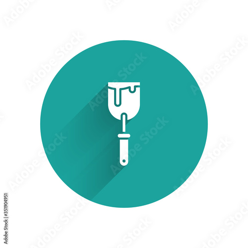 White Putty knife icon isolated with long shadow. Spatula repair tool. Spackling or paint instruments. Green circle button. Vector