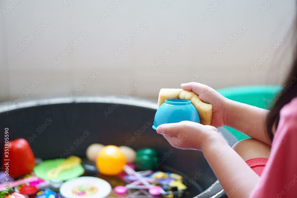 Cleaning Colorful Plastic Toy