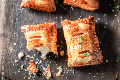 Homemade and tasty sausage in puff pastry for breakfast