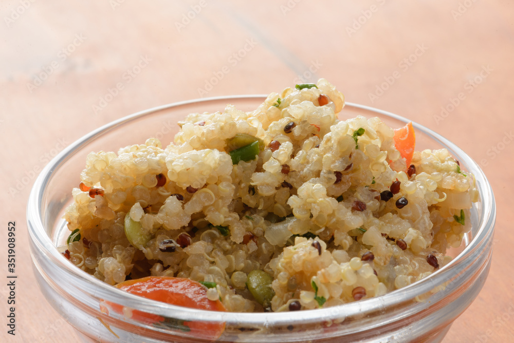 Cooked quinoa in glass bowl Cooked quinoa in glass bowl