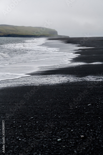 Atlantic landscape. Black sand beach in Iceland. photo