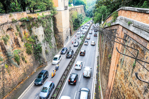 Canvas Print Top view of a busy street in the ancient city of Rome, Italy - Street is full of