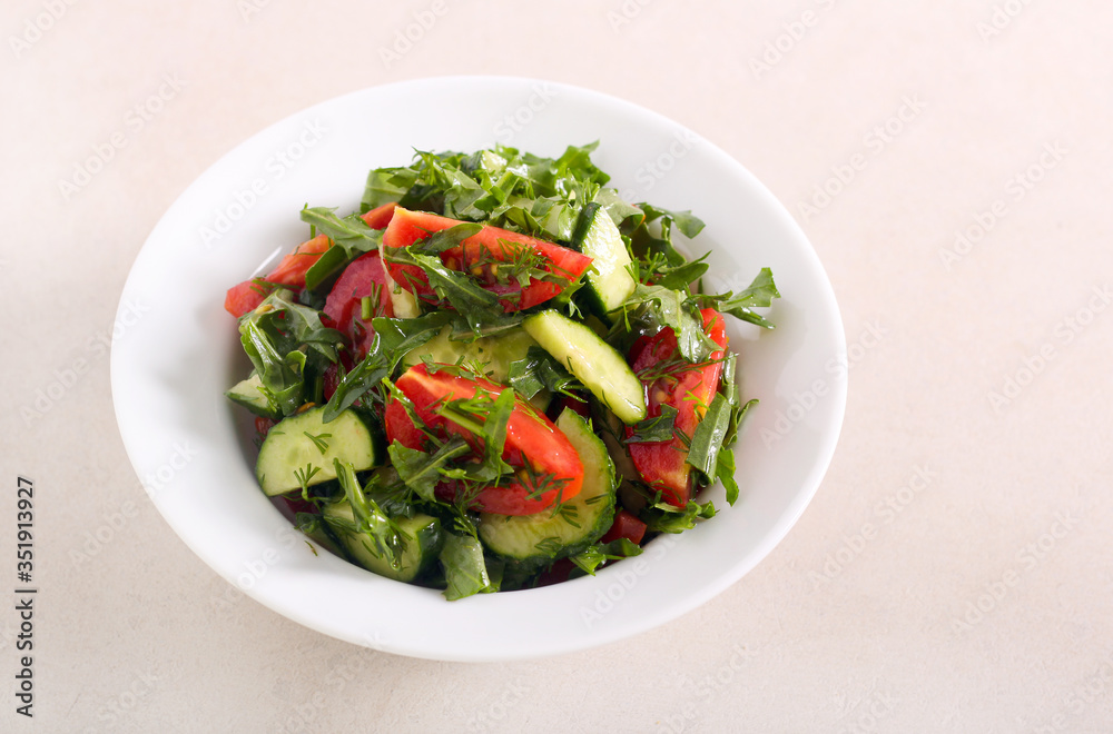 Fresh summer salad with cucumbers, tomatoes