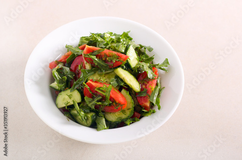 Fresh summer salad with cucumbers, tomatoes