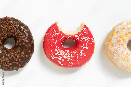 Appetizing sweet donut on a white background. Top view
