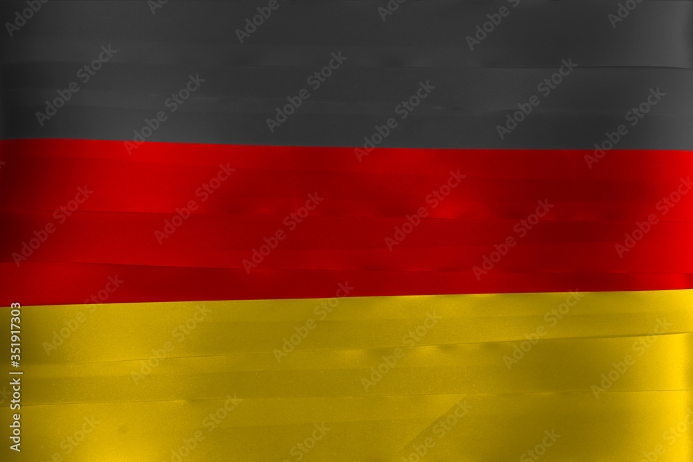 Fototapeta premium Colorful ribbon as Germany national flag, the black red and yellow.