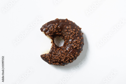 Appetizing sweet donut on a white background. Top view