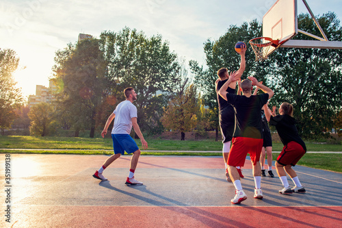 Group Of Young Friends Playing Basketball Match © FS-Stock
