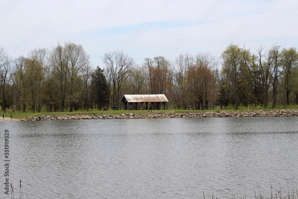 The picnic shelter at the lake in the country park.