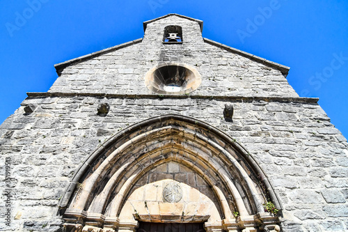 sign on wall of building, photo as a background, photo as a background , in Navarra Aragon Zaragoza spain europe , roncisvalle camino de santiago city photo