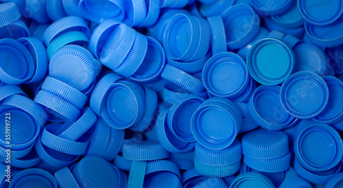 The plastic lid that is left over from the bottles are collected to be recycled into other items for reuse.