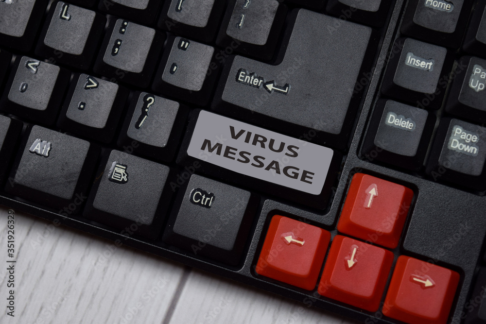 Virus Message write on keyboard isolated on laptop background Virus Message write on keyboard isolated on laptop background