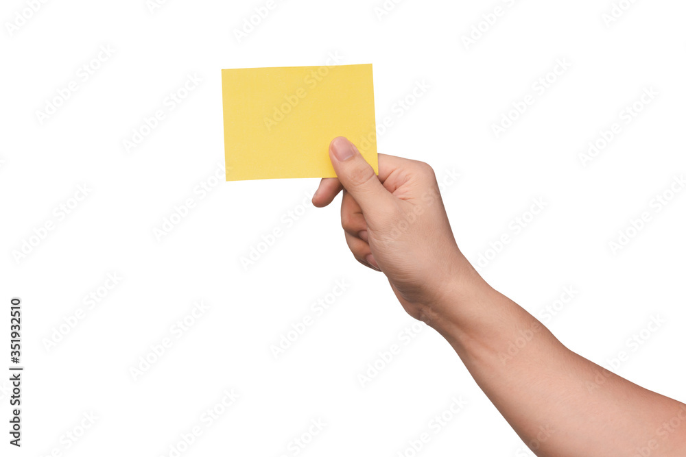 Hand holding yellow paper isolated on white with clipping path. Hand holding yellow paper isolated on white with clipping path.