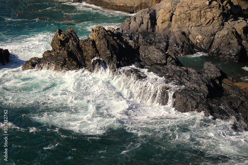 Waves crashing on a rocky shore