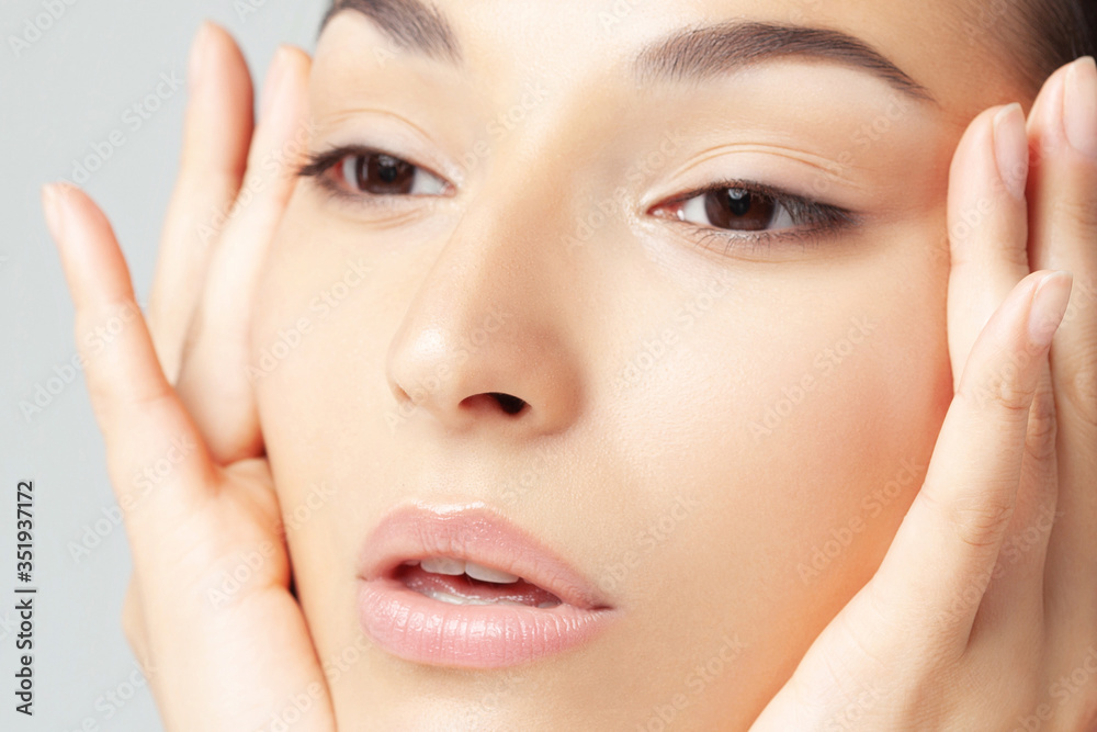 Portrait of young beautiful woman with clean perfect skin Portrait of young beautiful woman with clean perfect skin
