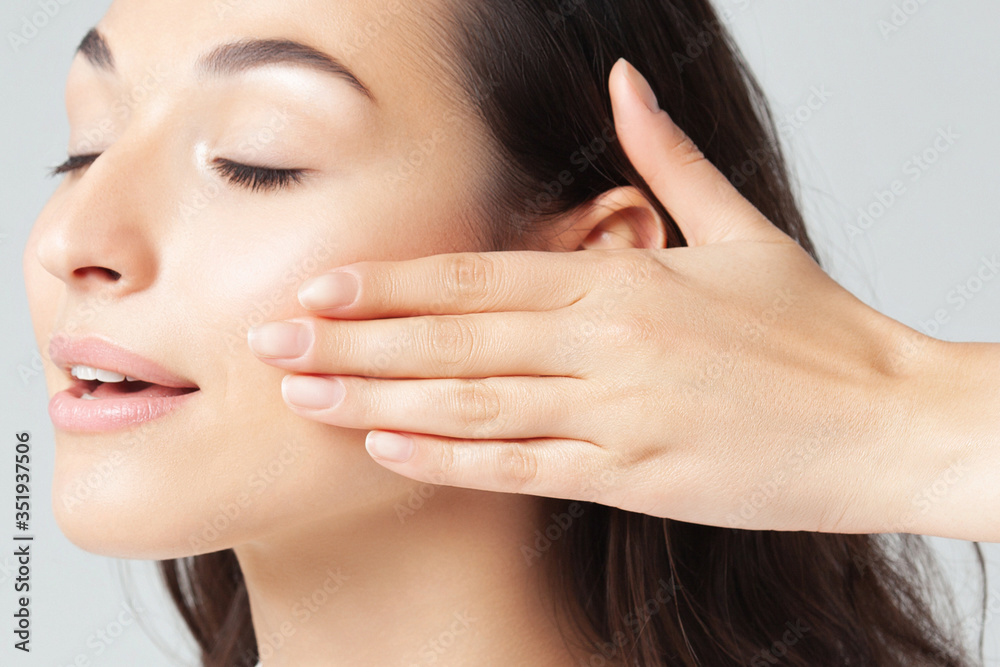 Portrait of young beautiful woman with clean perfect skin Portrait of young beautiful woman with clean perfect skin