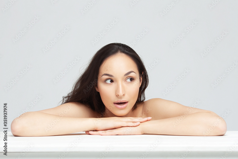 Portrait of young beautiful woman with clean perfect skin Portrait of young beautiful woman with clean perfect skin
