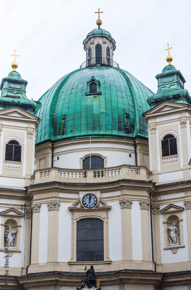 Facade of Peterkirche (St. Peter's church) in the old town, a Baroque Roman Catholic parish church in Vienna, Austria