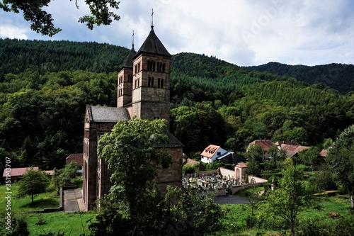 Panoramic view over the Abbey and the cemetery in the village of Murbach photo