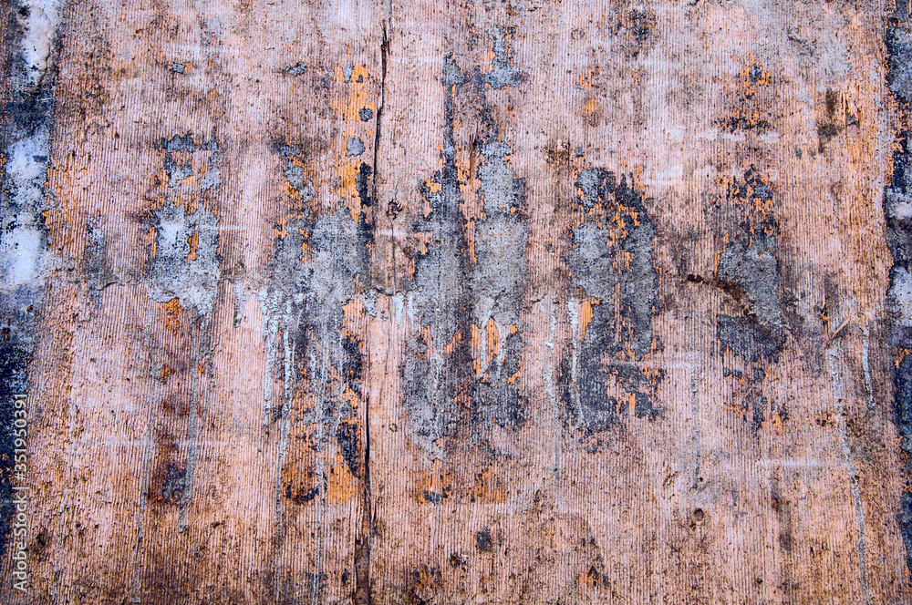 old wood background. cracked peeled plywood. worn boards. wood textured surface