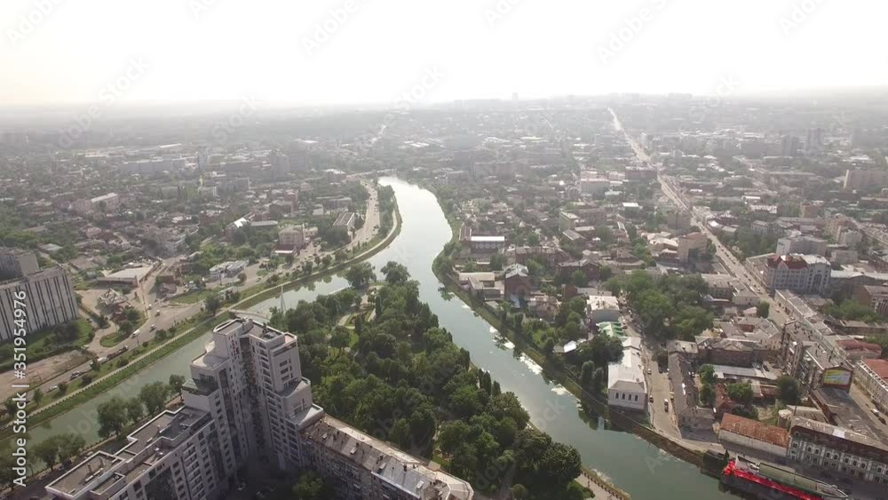 Aerial panorama of Kharkov city from above. Downtown or city center with famous historic buildings and green trees. Kharkov and Lopan rivers. Strelka park