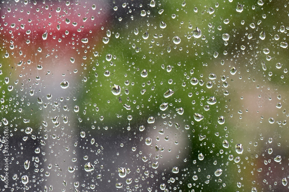 rain drops on a window rain drops on a window