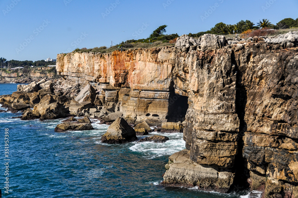 Atlantic Coast cliss of Portugal with blue sea and sky