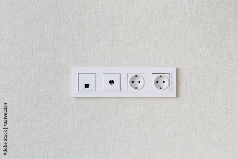TV, Internet, Euro sockets for connecting smart and satellite TV on the background of a light wall TV, Internet, Euro sockets for connecting smart and satellite TV on the background of a light wall