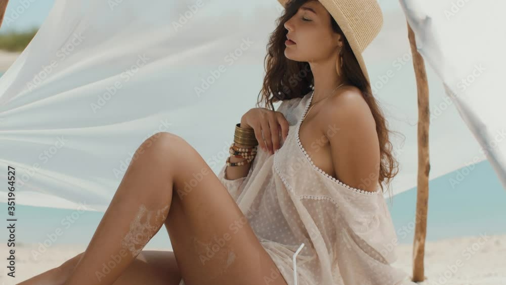 Woman Resting on the Beach During Vacation