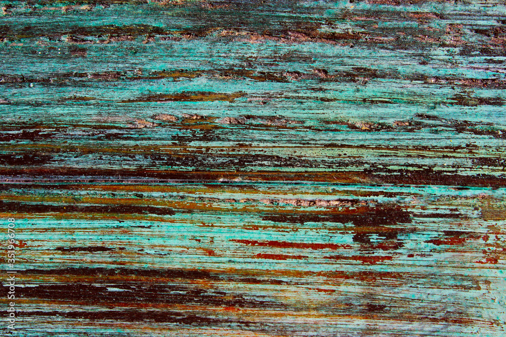 Blurred wooden texture background. Wooden wall texture grunge background with a lot of copy space for text. Abstract background, blue colors. Colorful wooden wall texture. Blurred wooden texture background. Wooden wall texture grunge background with a lot of copy space for text. Abstract background, blue colors. Colorful wooden wall texture.