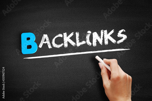 Backlinks text on blackboard, business concept background photo