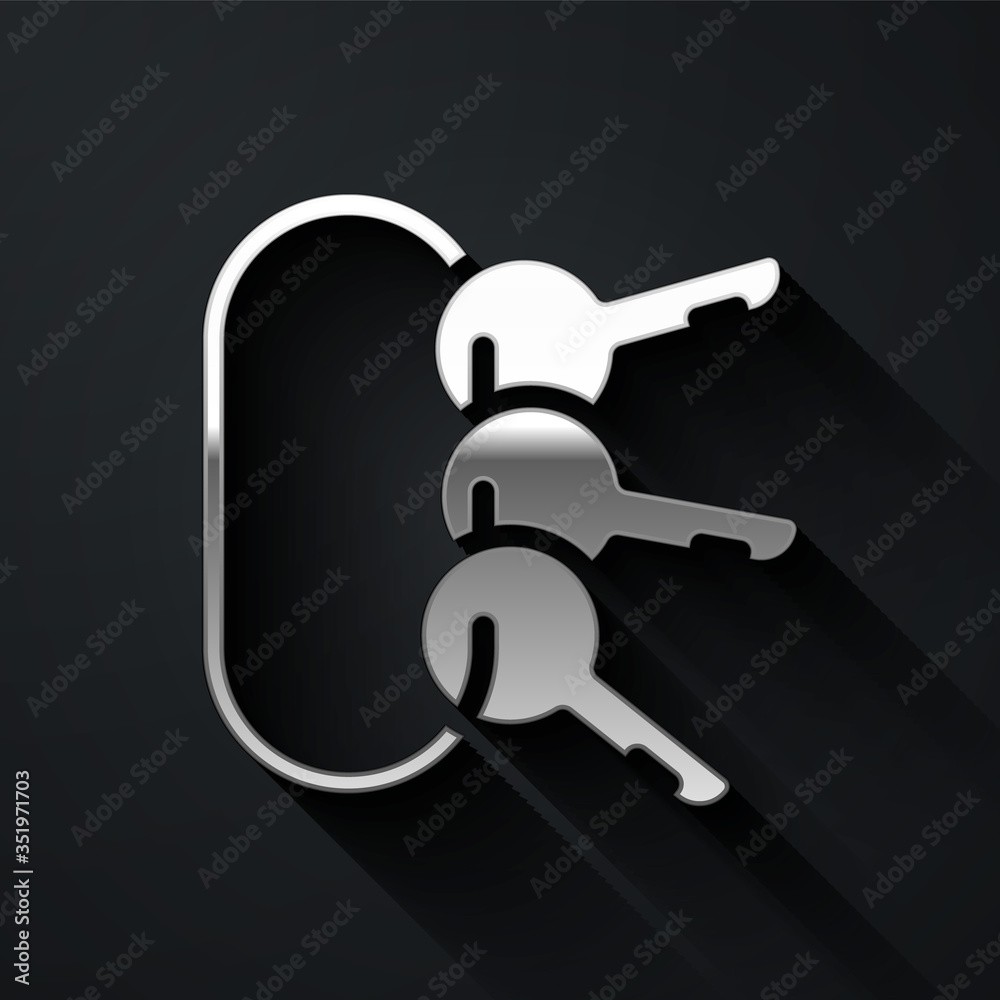 Silver Bunch of keys icon isolated on black background. Long shadow style. Vector