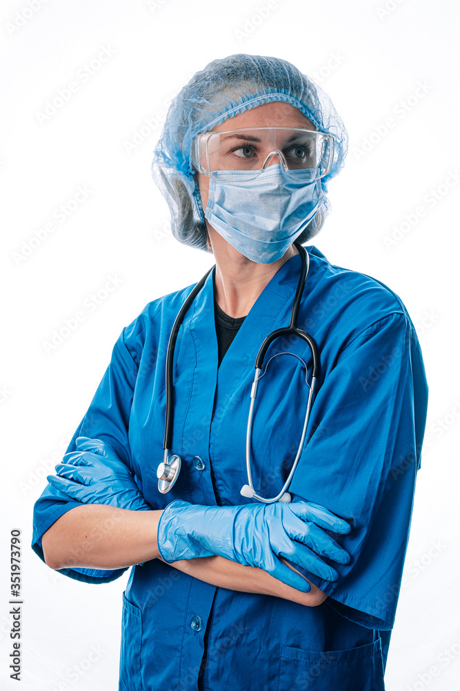 female doctor with a stethoscope on her neck, in a medical mask and glasses on her face on a white background female doctor with a stethoscope on her neck, in a medical mask and glasses on her face on a white background