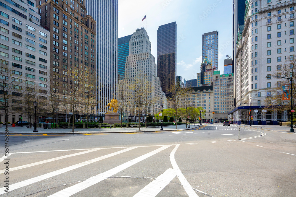NEW YORK CITY - Apr 17: Grand Army Plaza in New York on April 17; 2020. Grand Army Plaza lies at the intersection of Central Park South and Fifth Avenue in front of the Plaza Hotel in Manhattan.