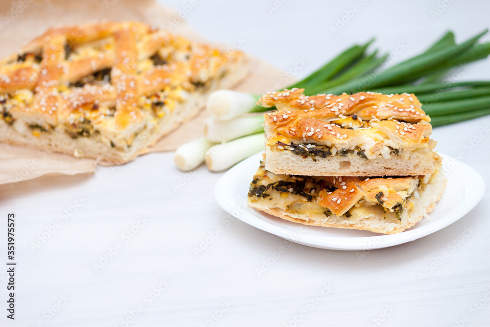 Spinach pie or spanakopita with spinach, cheese, eggs, onion.