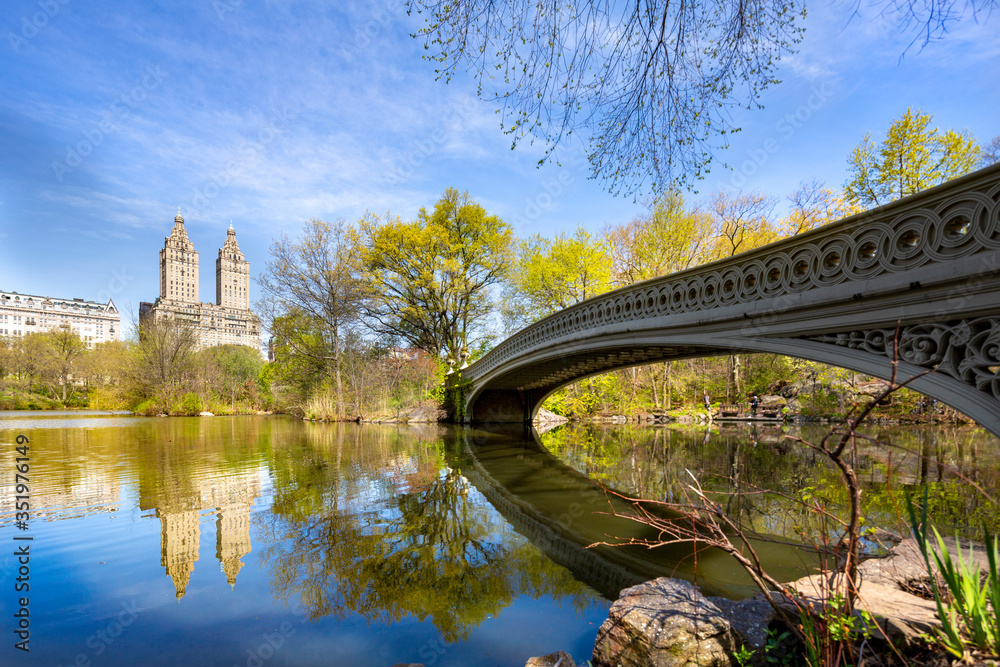 Bow bridge in Central park at spring sunny day. Manhattan