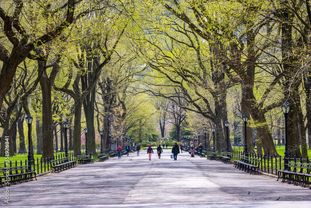 Manhattan, NY, USA- 4/17/20: people during the time of coronavirus in Central park