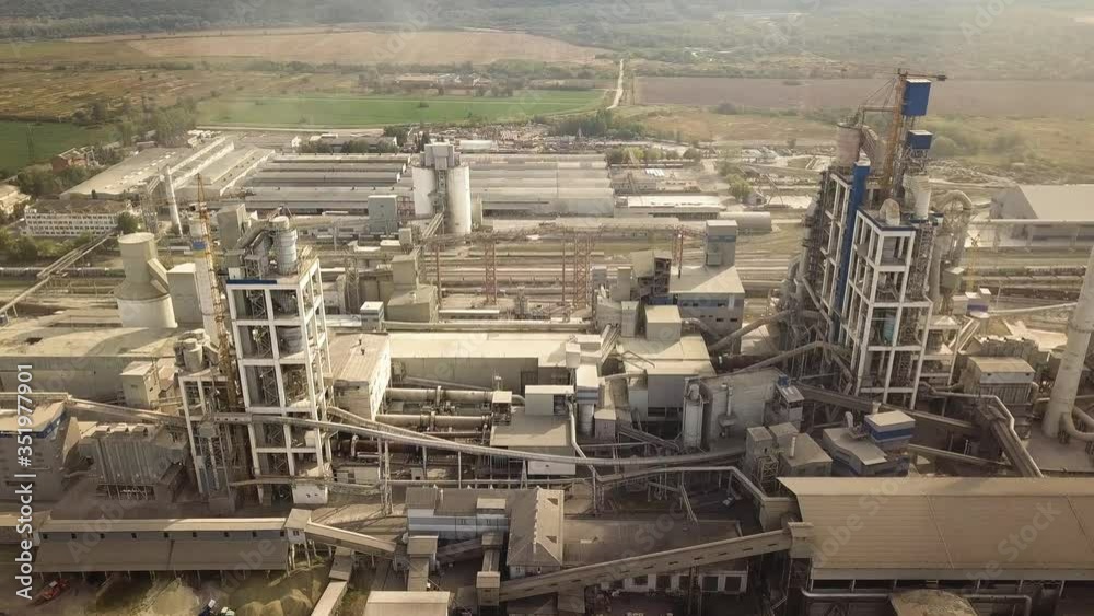 Aerial view of cement plant factory at industrial production area. Aerial view of cement plant factory at industrial production area.