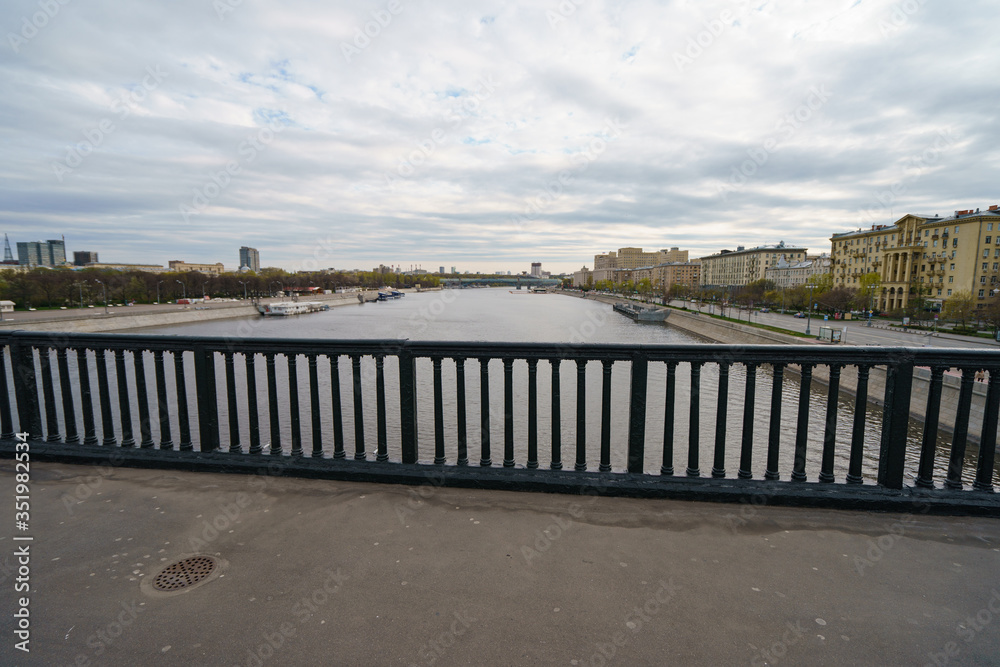 Moscow cityscapein in day. Wide Moskva River. Closed public Groky Park on left, Frunzenskaya embankment on right. Academy of Sciences, Andreevsky /Pushkinsky pedestrian bridge, Ministry of Defence Moscow cityscapein in day. Wide Moskva River. Closed public Groky Park on left, Frunzenskaya embankment on right. Academy of Sciences, Andreevsky /Pushkinsky pedestrian bridge, Ministry of Defence