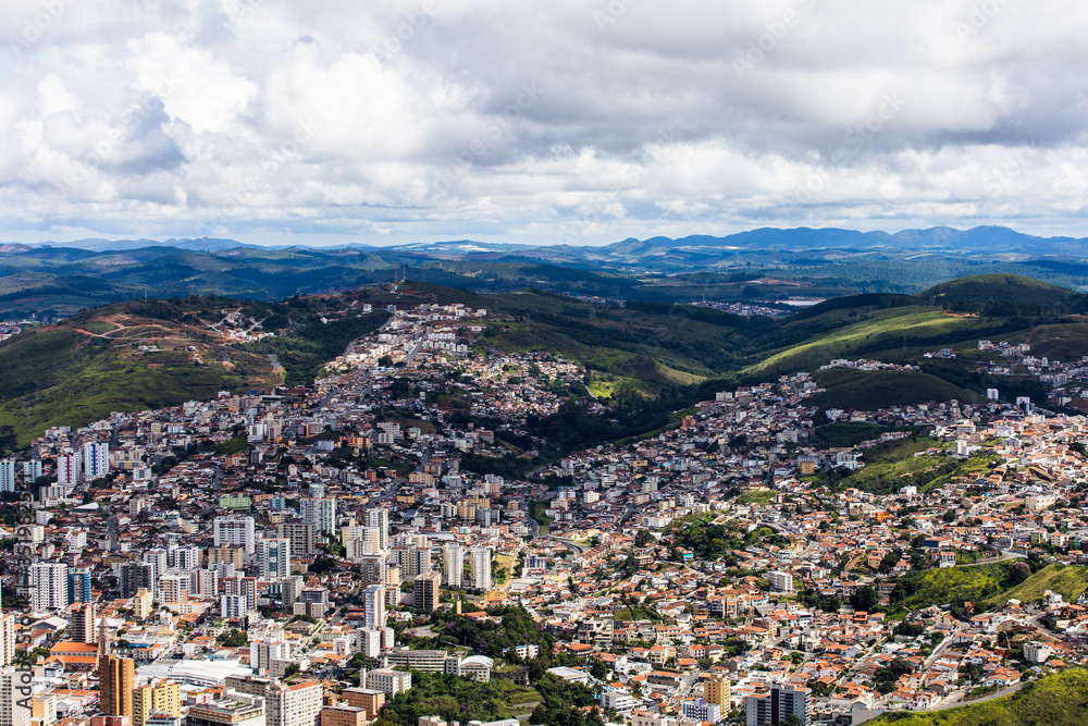 View of city of Poços de Caldas in Minas gerais in Brazil with beautiful and colorful mountains