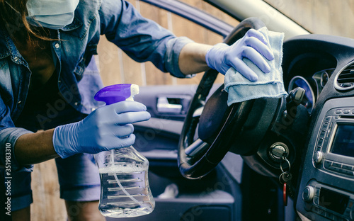 sanitizing car interior covid prevention © Melinda Nagy